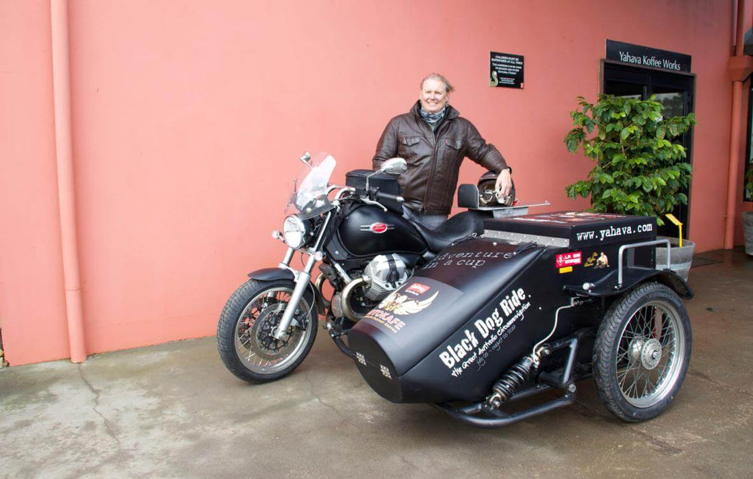 Man with Motorbike and sidecart used for the Yahava MotoKafe Project
