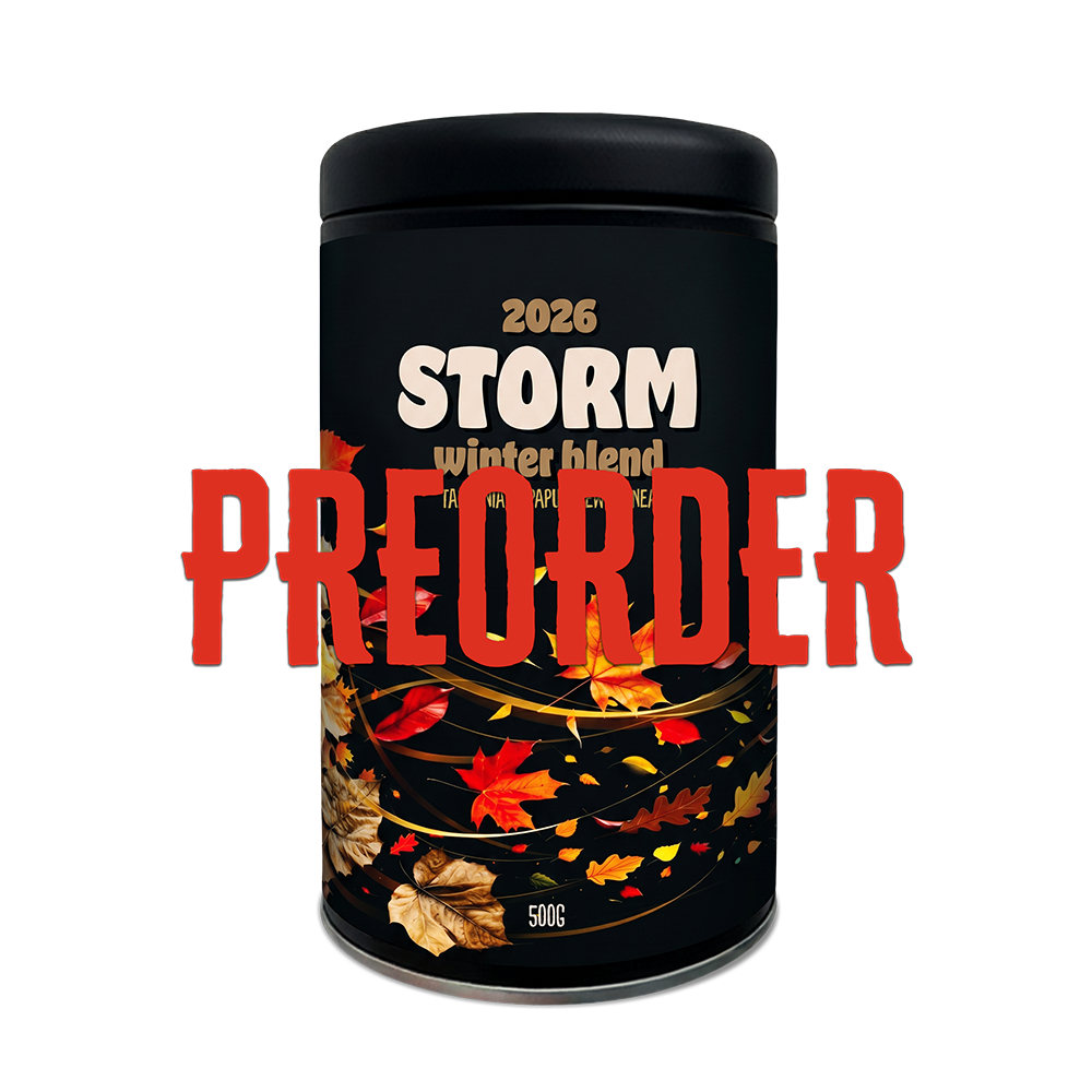 Black container with autumn leaf design and '2026 Storm Winter Blend' text on a white background
