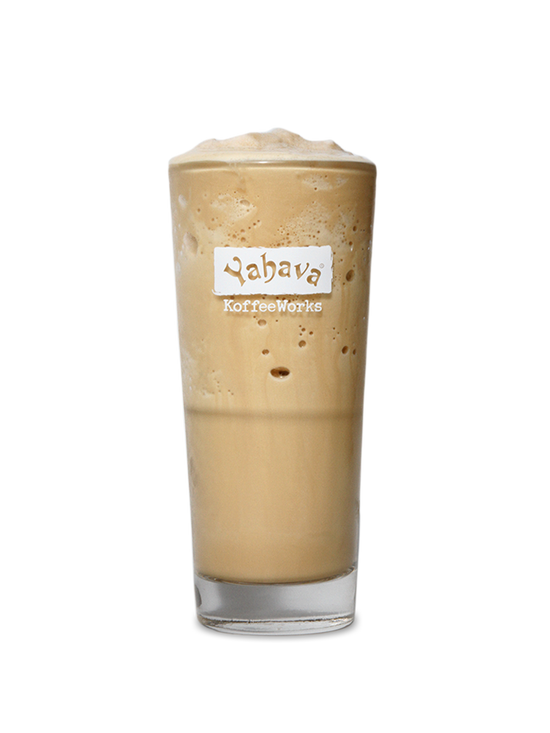 Glass of Toffee Koffee Frappe with a 'Yahava KoffeeWorks' label on a white background